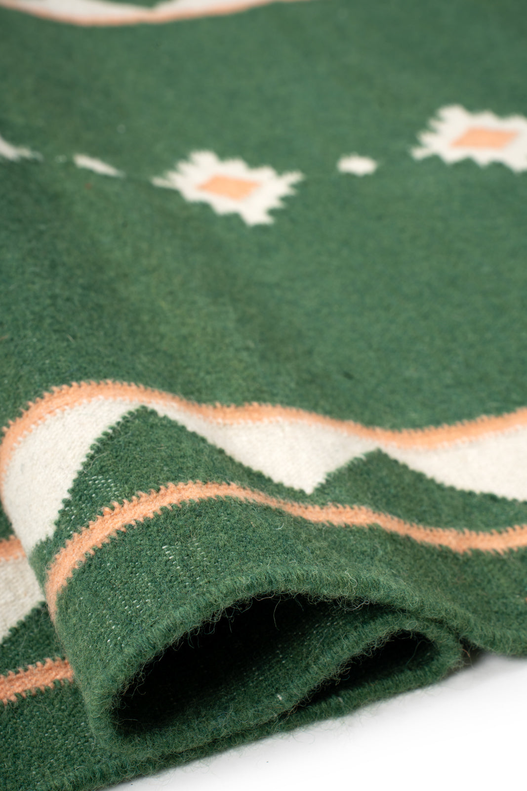 Forest Ember Dhurrie Runner - cotton runner laid in a hallway view