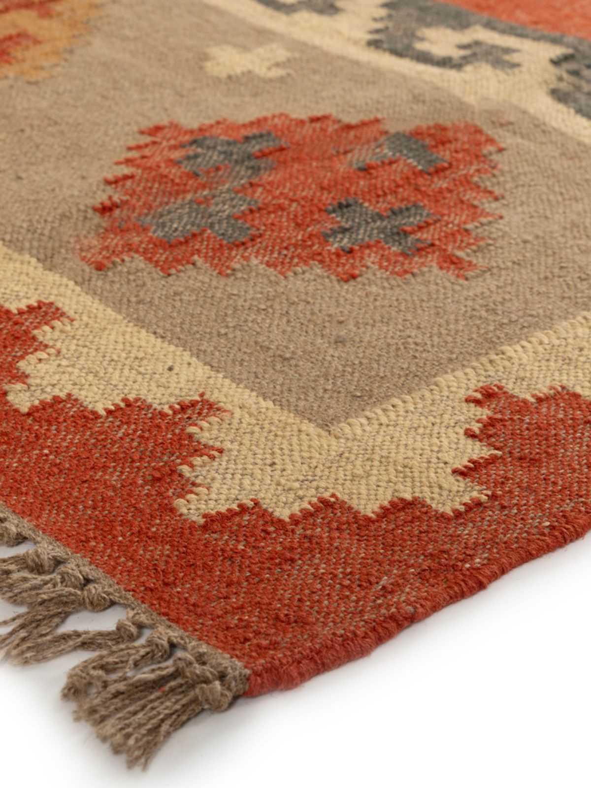 Garnet Glow Kilim Rug close-up showing the cotton weave and geometric motif