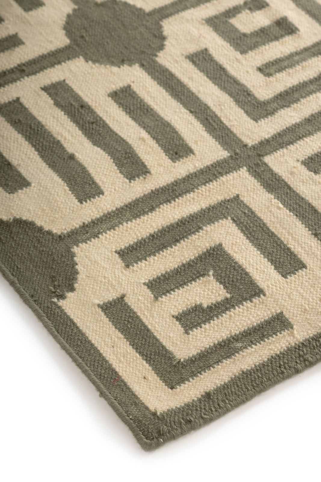 GeoEssence Wool Flatweave Rug close-up showing the wool weave and geometric motif