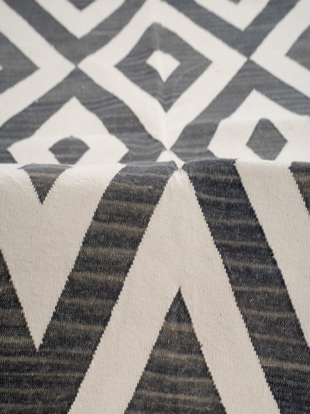 Geometric Diamonds Flatweave Cotton Rug close-up showing the cotton weave and geometric motif