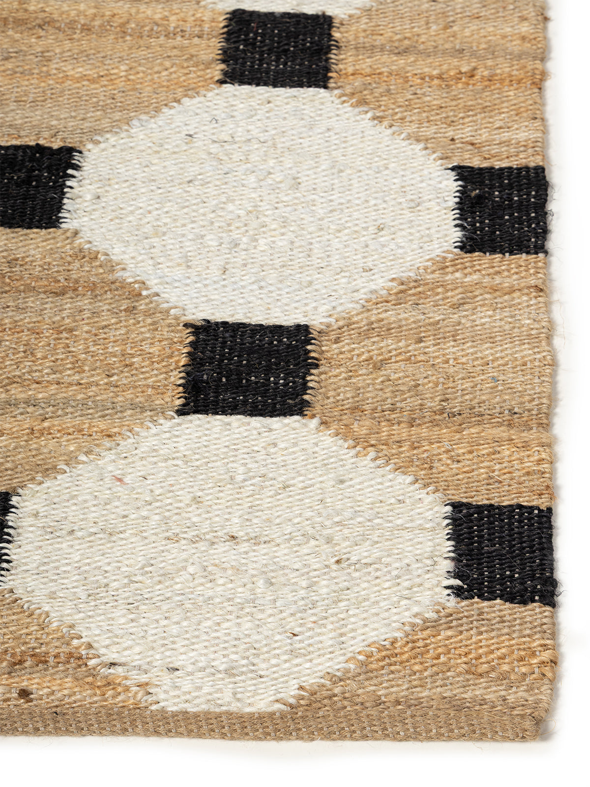 Geoweave Jute Rug jute rug styled in a living room interior with timber and linen