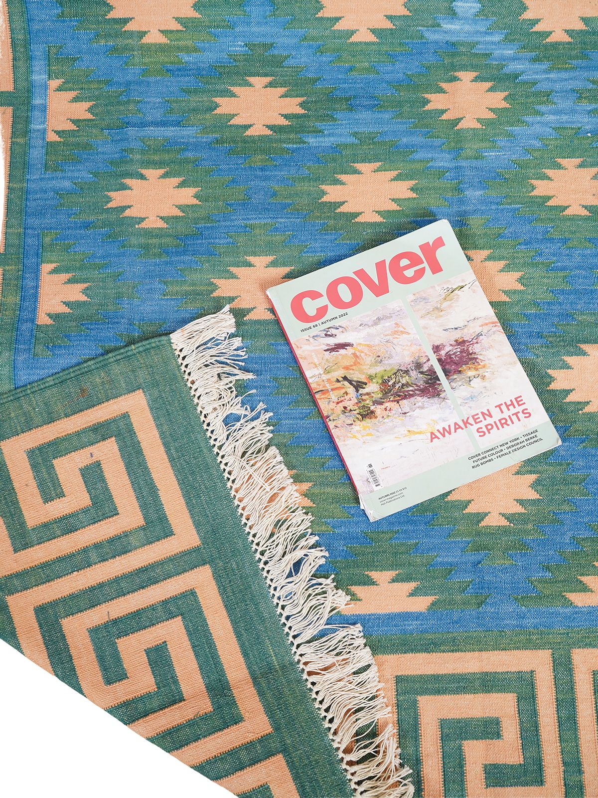 Green hellenic Flatweave rug cotton rug styled in a living room interior