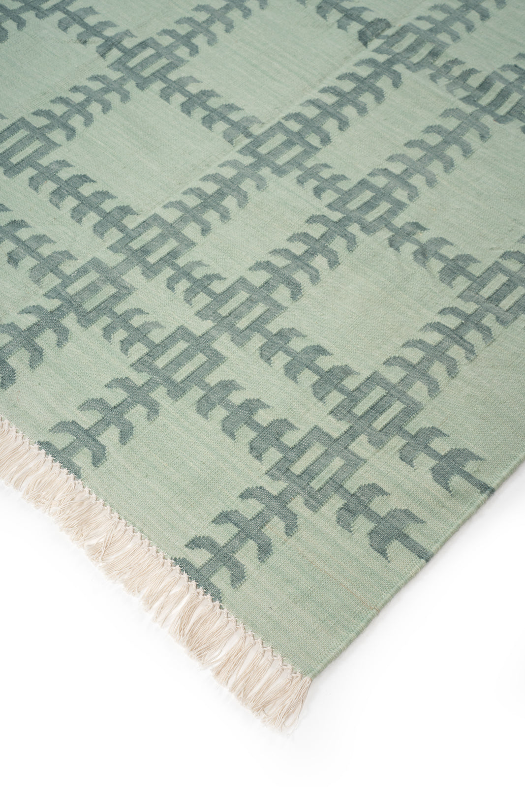 Gridline Flatweave Rug close-up showing the cotton weave and geometric motif