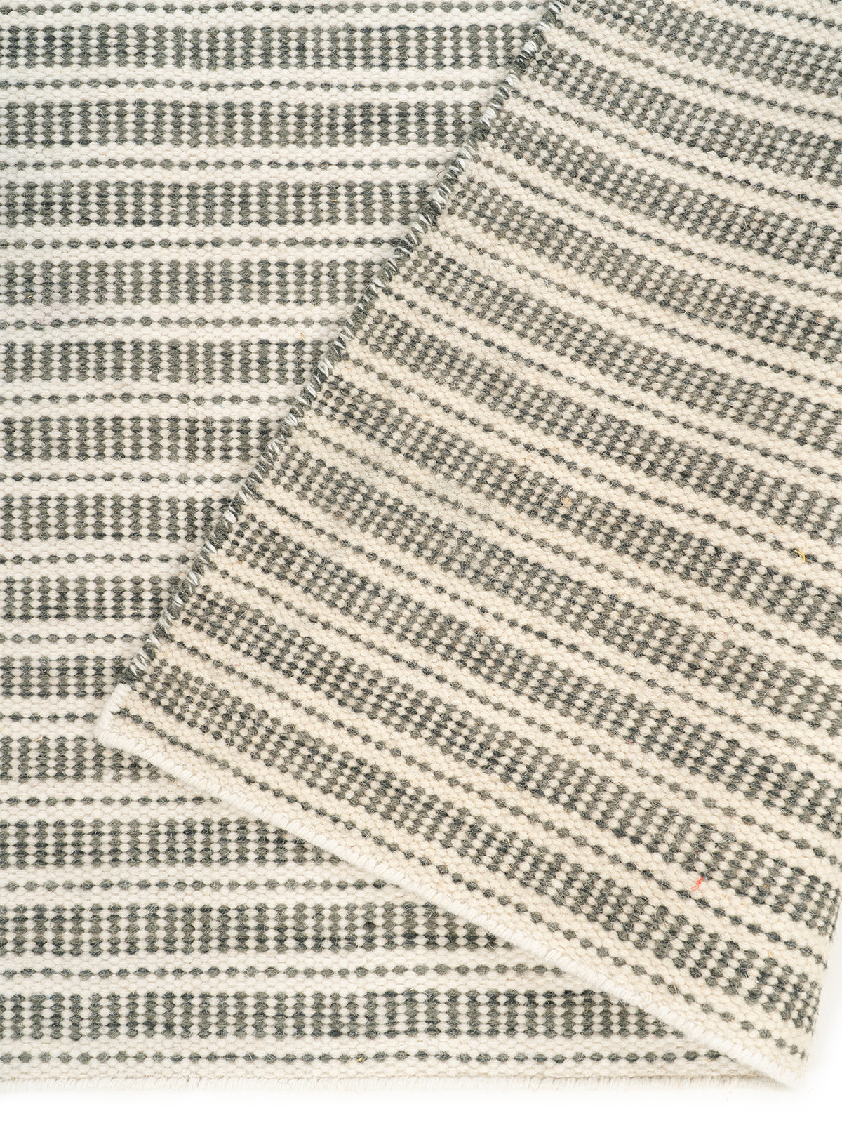 Harrow Handwoven Wool Rug detail showing the textured wool surface and finishing