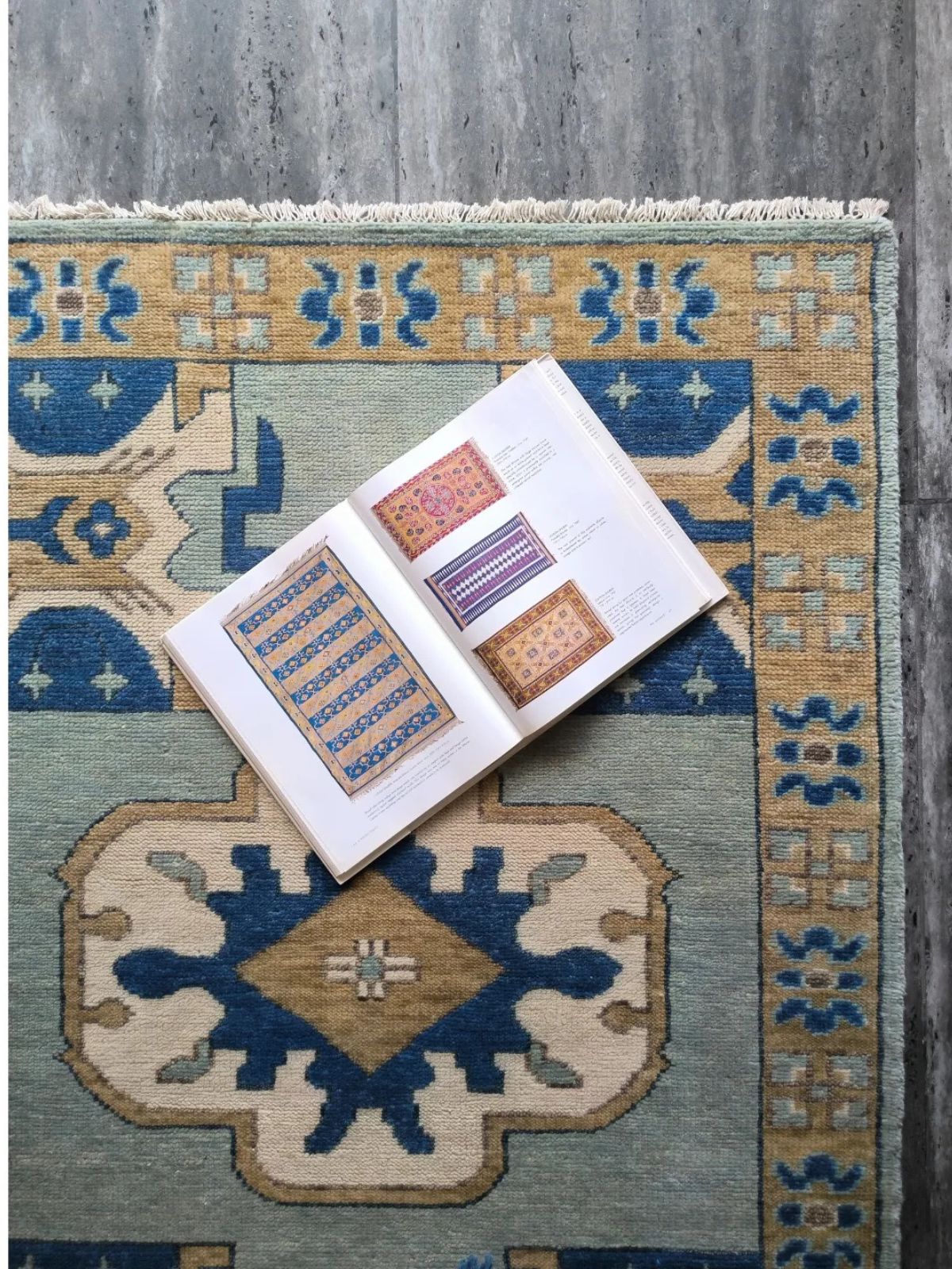 Heritage Heirloom Oushak Rug wool rug styled in a living room interior