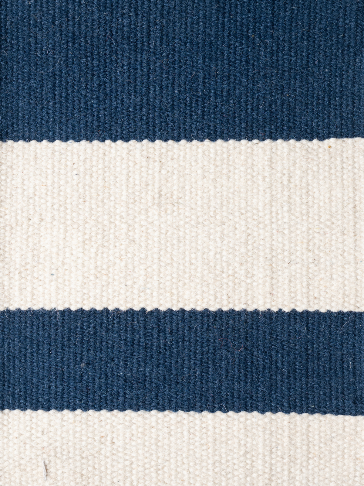 Horizon : Midnight nz wool rug styled in a living room interior
