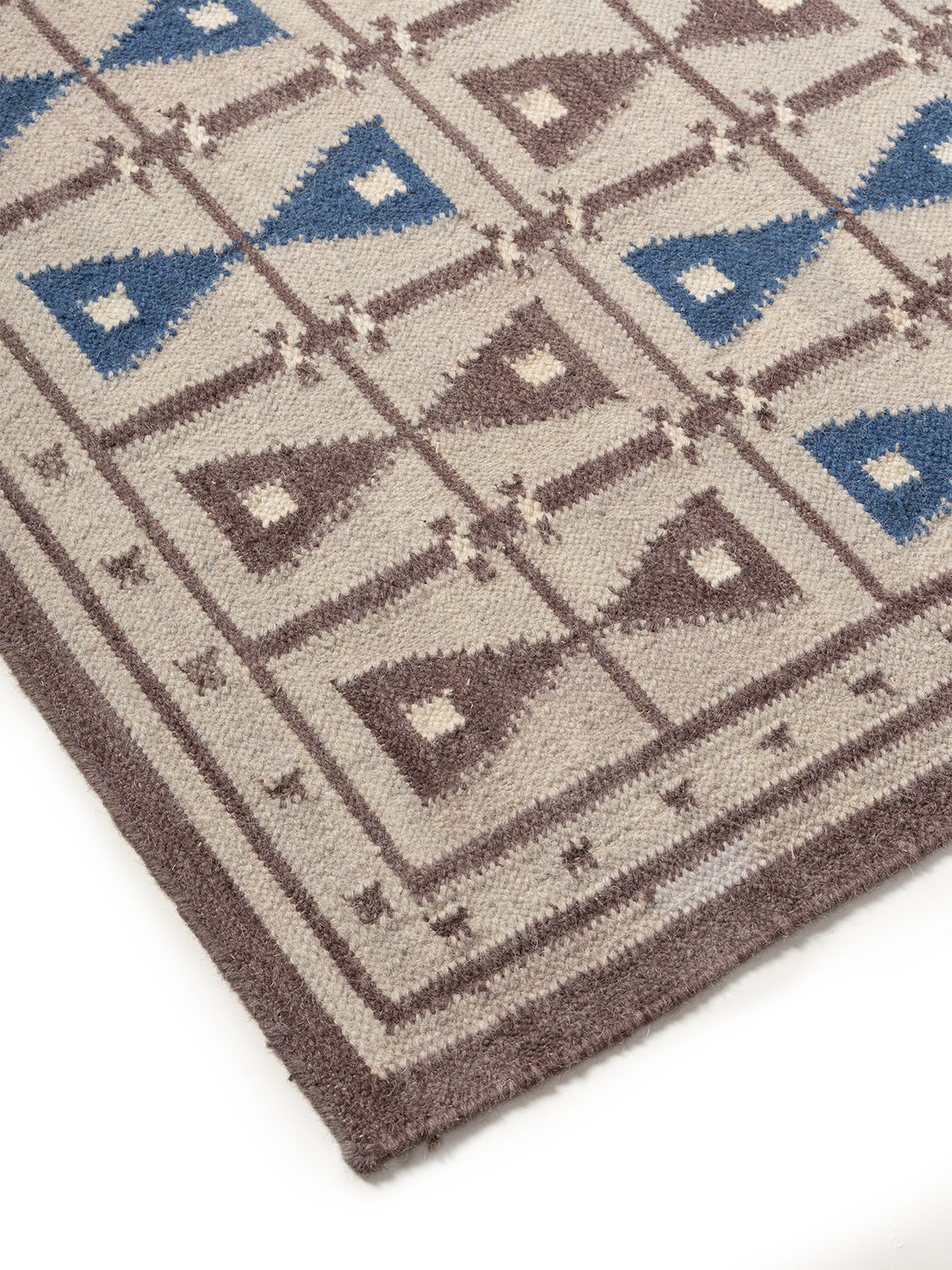 Hourglass Harmony Rug close-up showing the jute weave and geometric motif