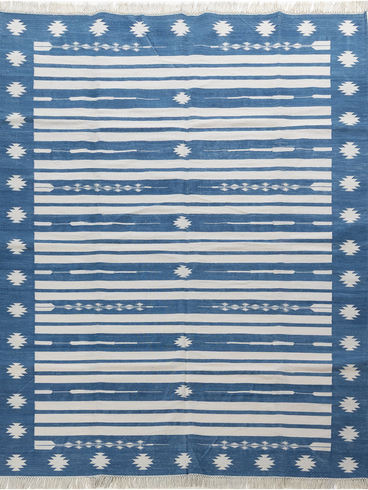 Indigo Horizon cotton rug in blue tones