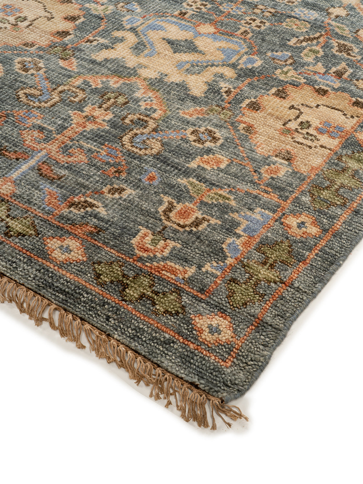 Kashmir Bloom Wool Rug close-up showing the handspun wool pile and floral motif
