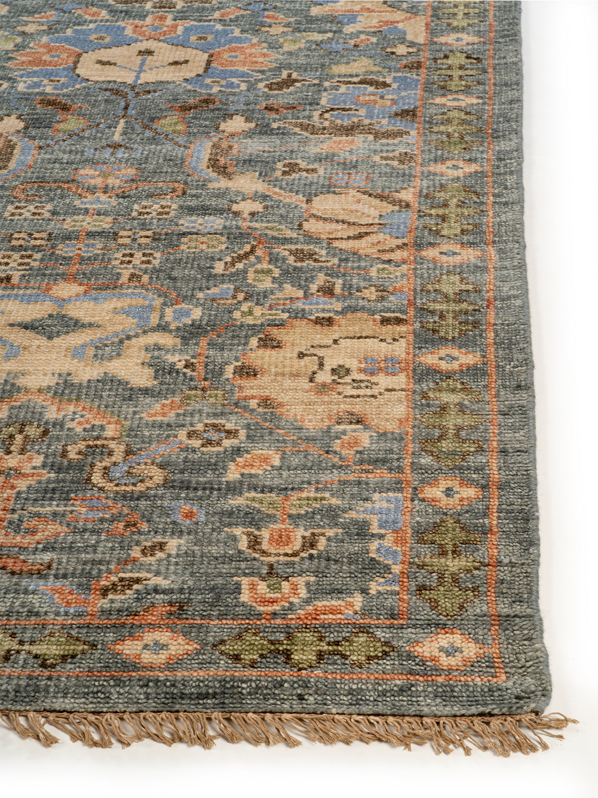 Kashmir Bloom Wool Rug handspun wool rug styled in a living room interior