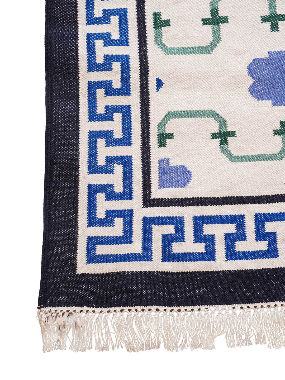Keyed Rajput Heritage Rug-Blue wool rug styled in a living room interior