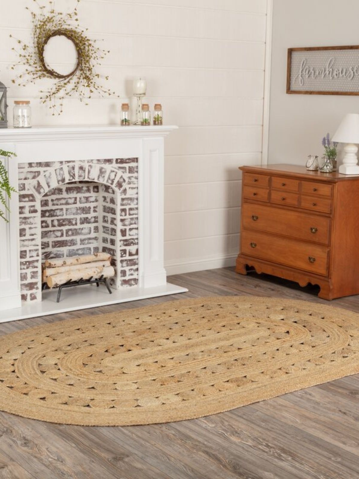Kidal natural jute braided oval rug jute rug styled in a living room interior