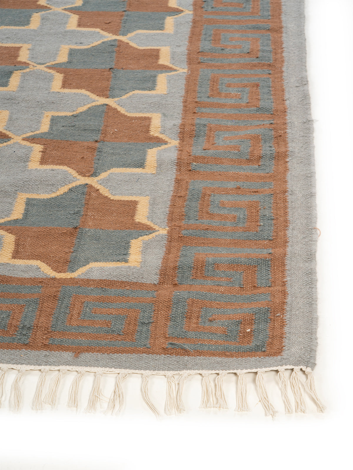 Kilim Quatrefoil Wool Rug wool rug styled in a living room interior