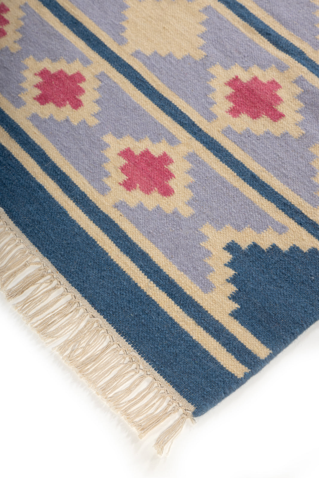 Kilim Reverie Wool Flatweave close-up showing the wool weave and traditional motif