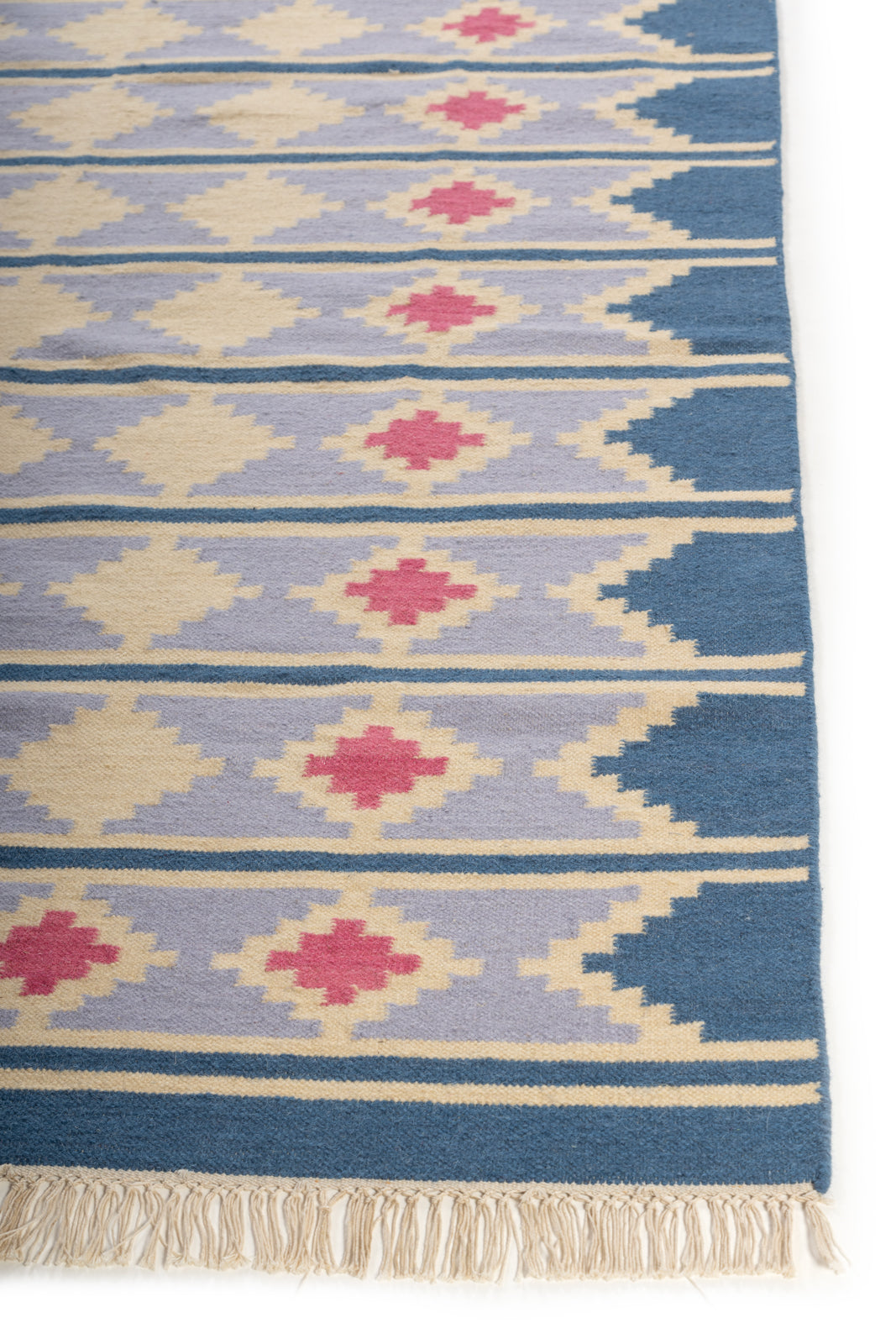 Kilim Reverie Wool Flatweave wool rug styled in a living room interior