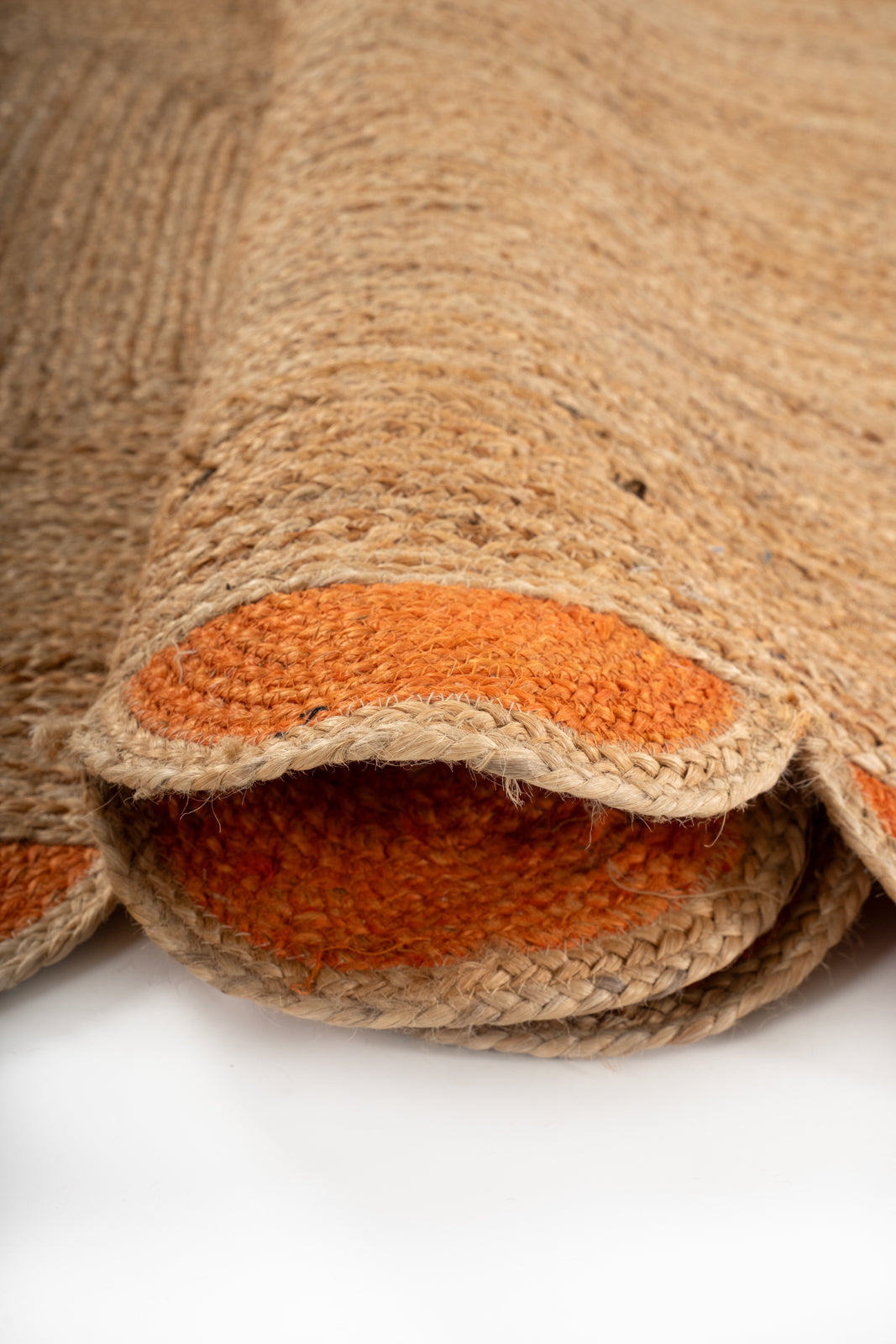 Kribi scalloped jute area rug-Orange - additional product view showing the jute rug