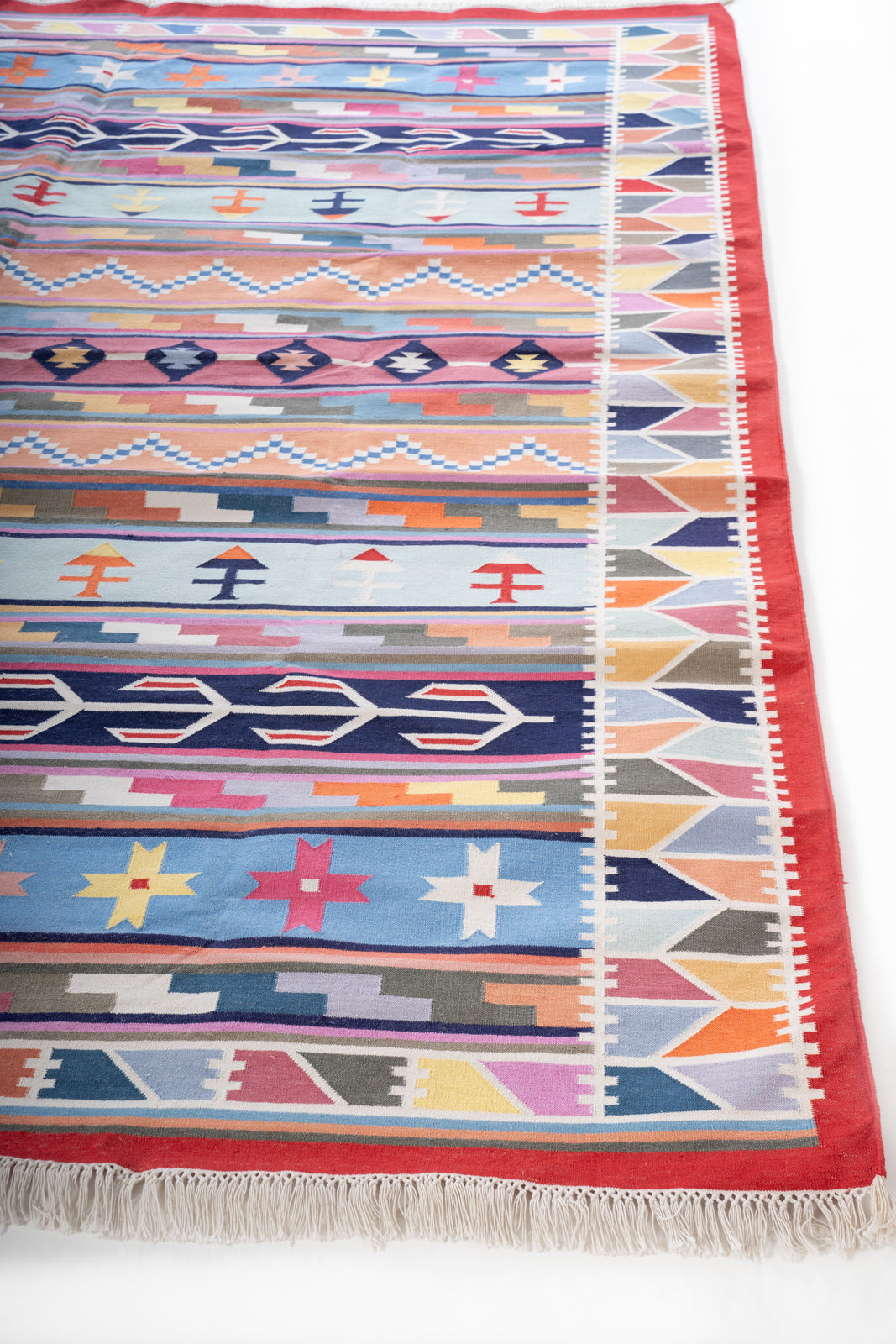 Kutch Desert Sunset Dhurrie Rug cotton rug styled in a living room interior