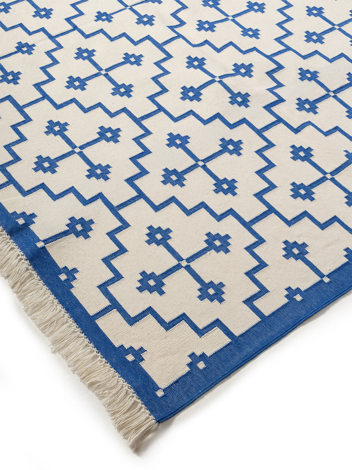 Labyrinth Weave Rug close-up showing the cotton weave and geometric motif
