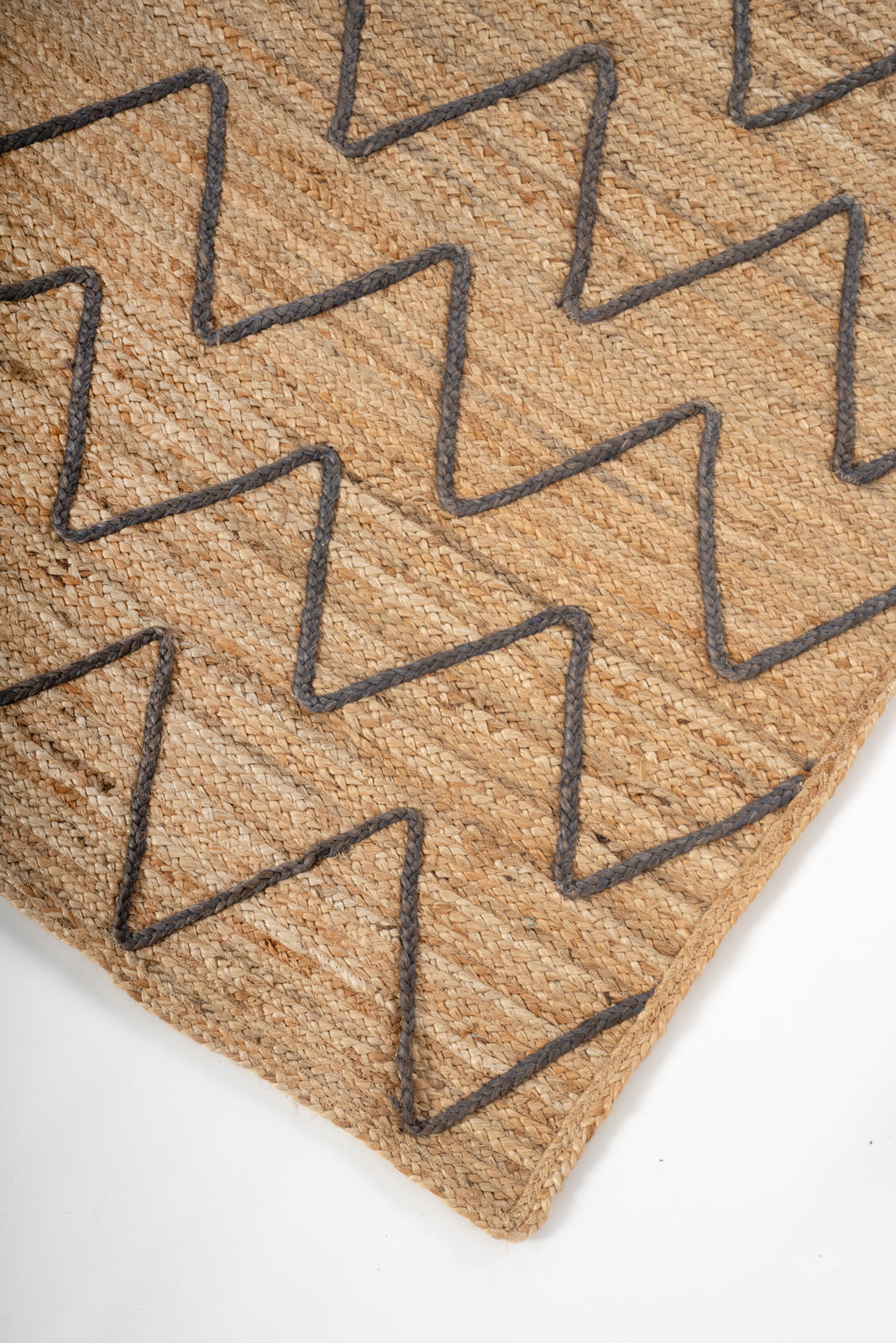 Lagos Zig Zag Braided Rug-Brown close-up showing the jute weave and geometric motif