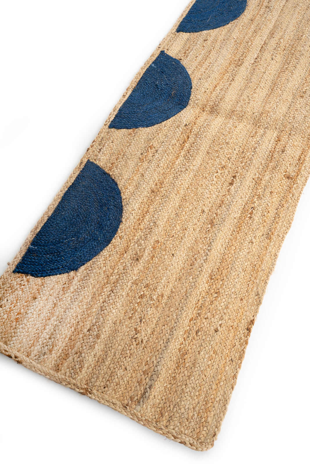 Lira runner rug close-up showing the hemp weave and texture surface