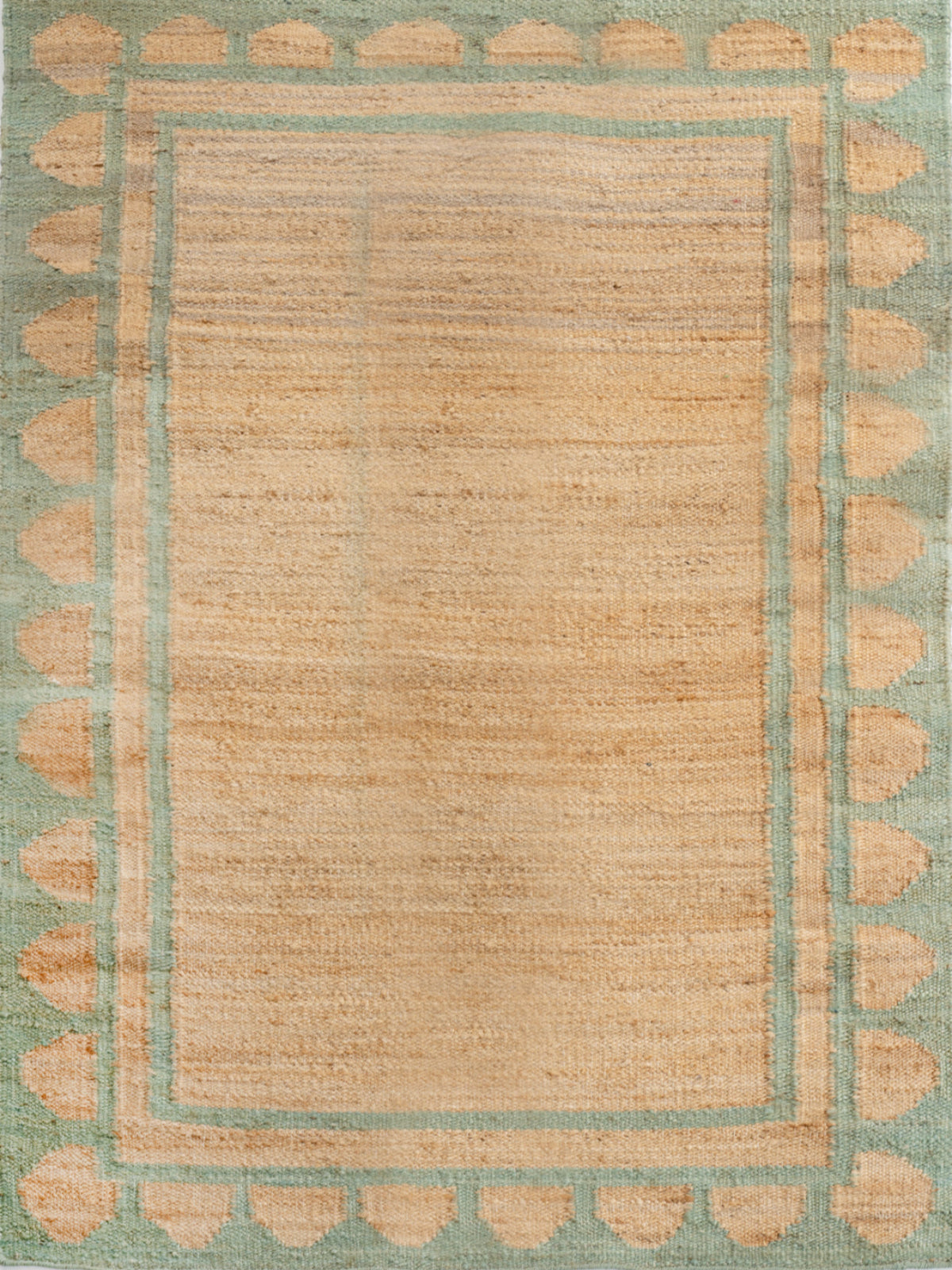 Lira scalloped hemp rug-Green hemp rug in green tones