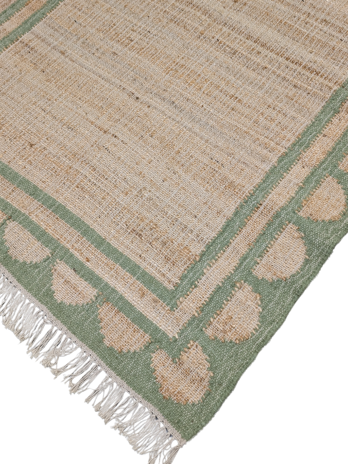 Lira scalloped Jute Rug-Green close-up showing the jute weave and surface texture