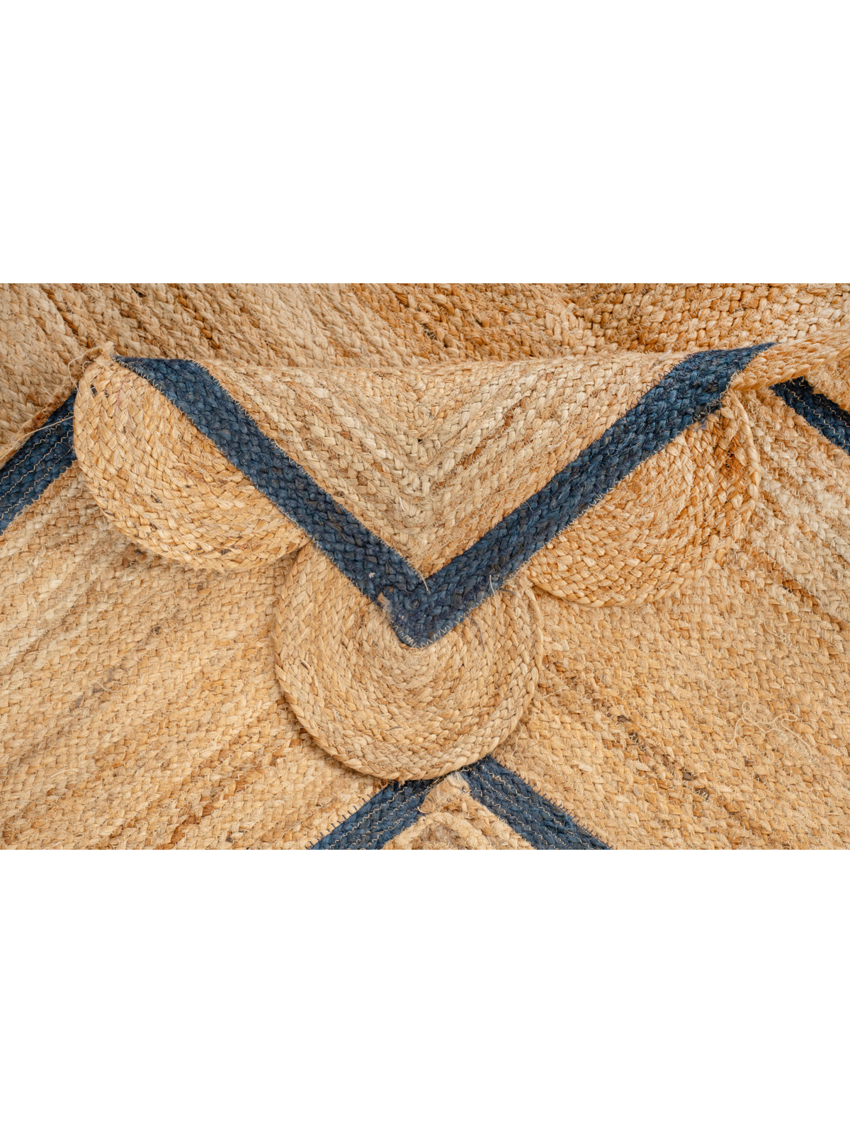 Loko scalloped square jute rug-Navy detail showing the textured jute surface and finishing