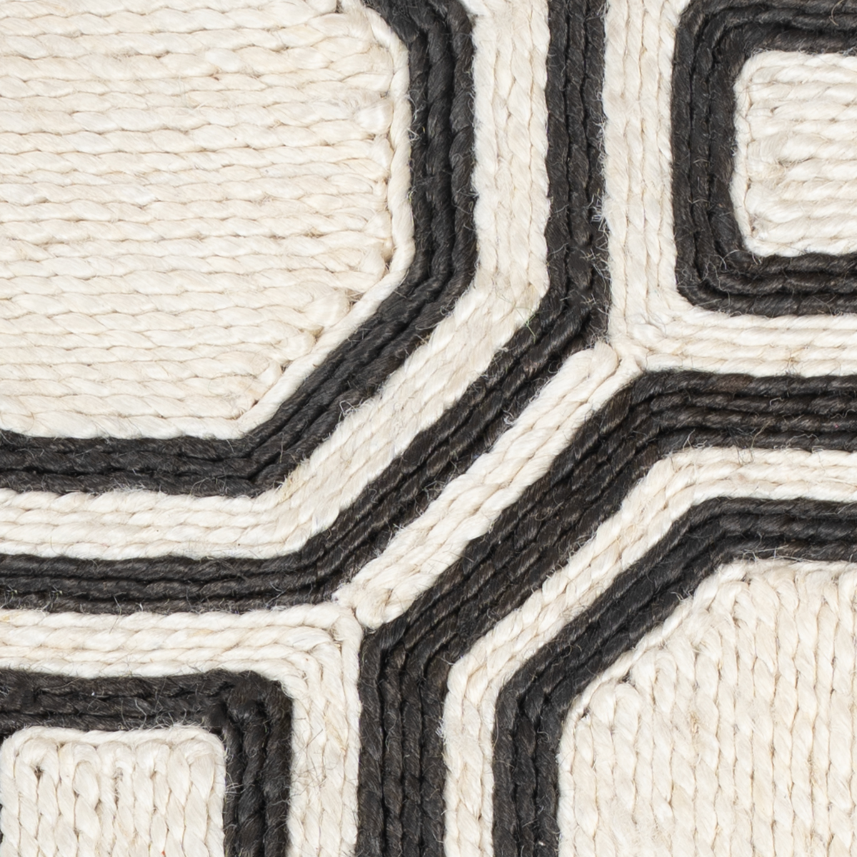 Looma : Chakra close-up showing the mixed fibre weave and geometric motif