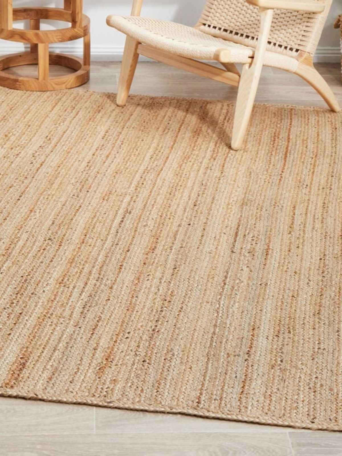 Lusaka natural jute braided area rug - jute runner laid in a hallway view