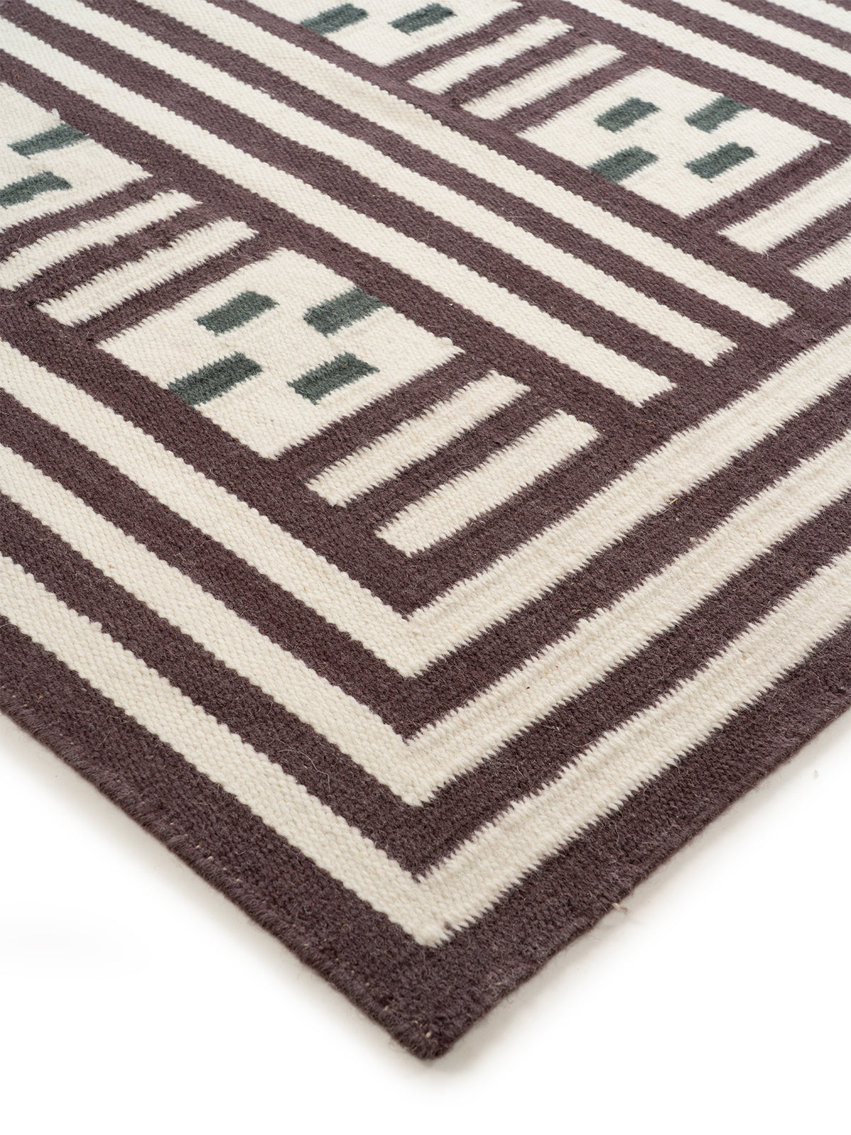 Maltese Cross Flatweave Rug close-up showing the wool weave and geometric motif