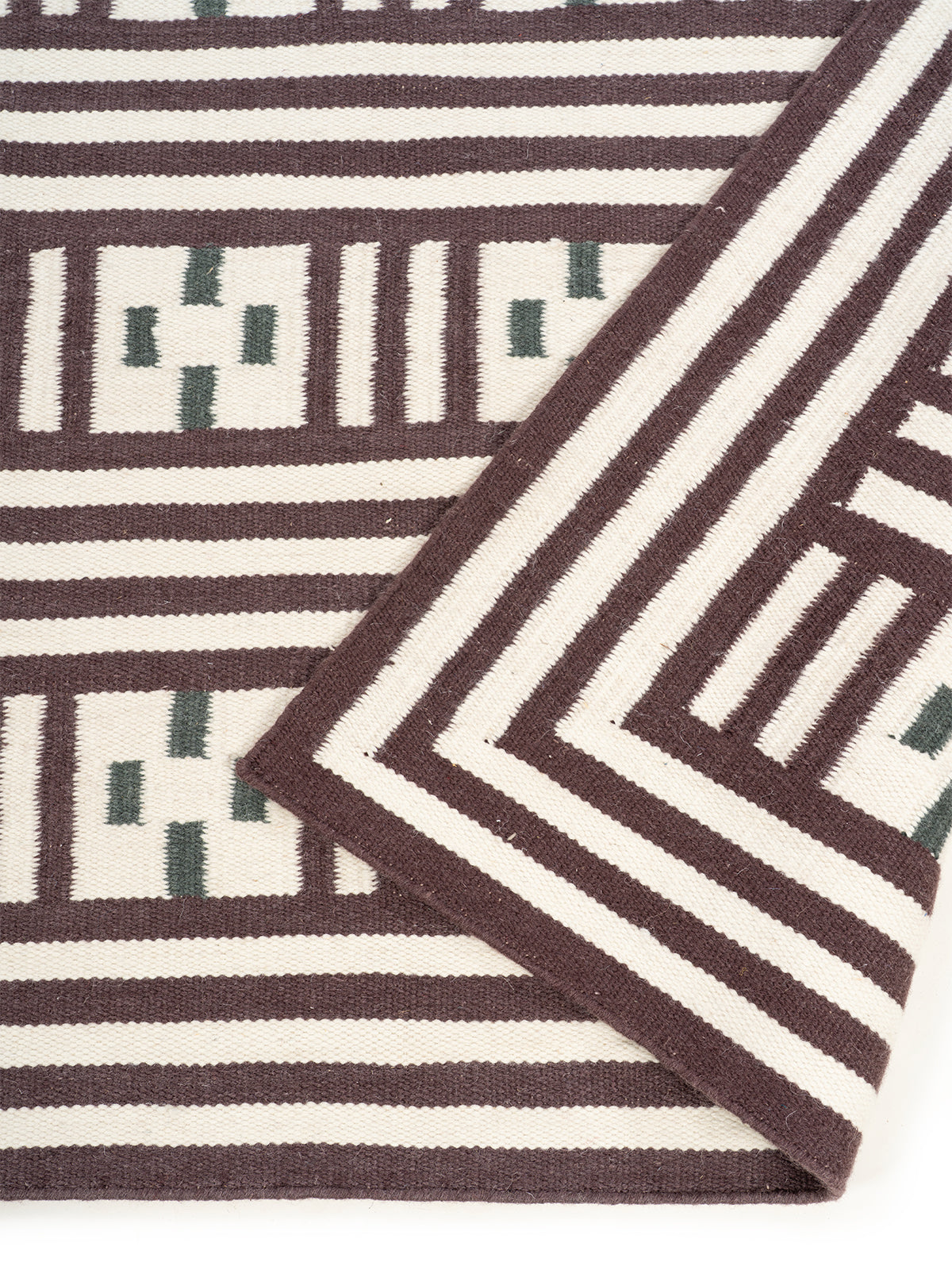 Maltese Cross Flatweave Rug detail of the geometric pattern in wool