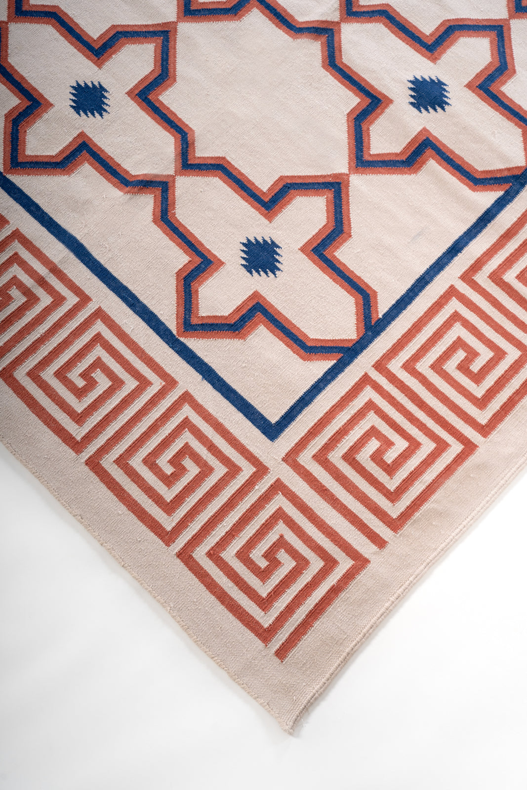 Mandvi Lattice Flatweave Rug close-up showing the cotton weave and geometric motif