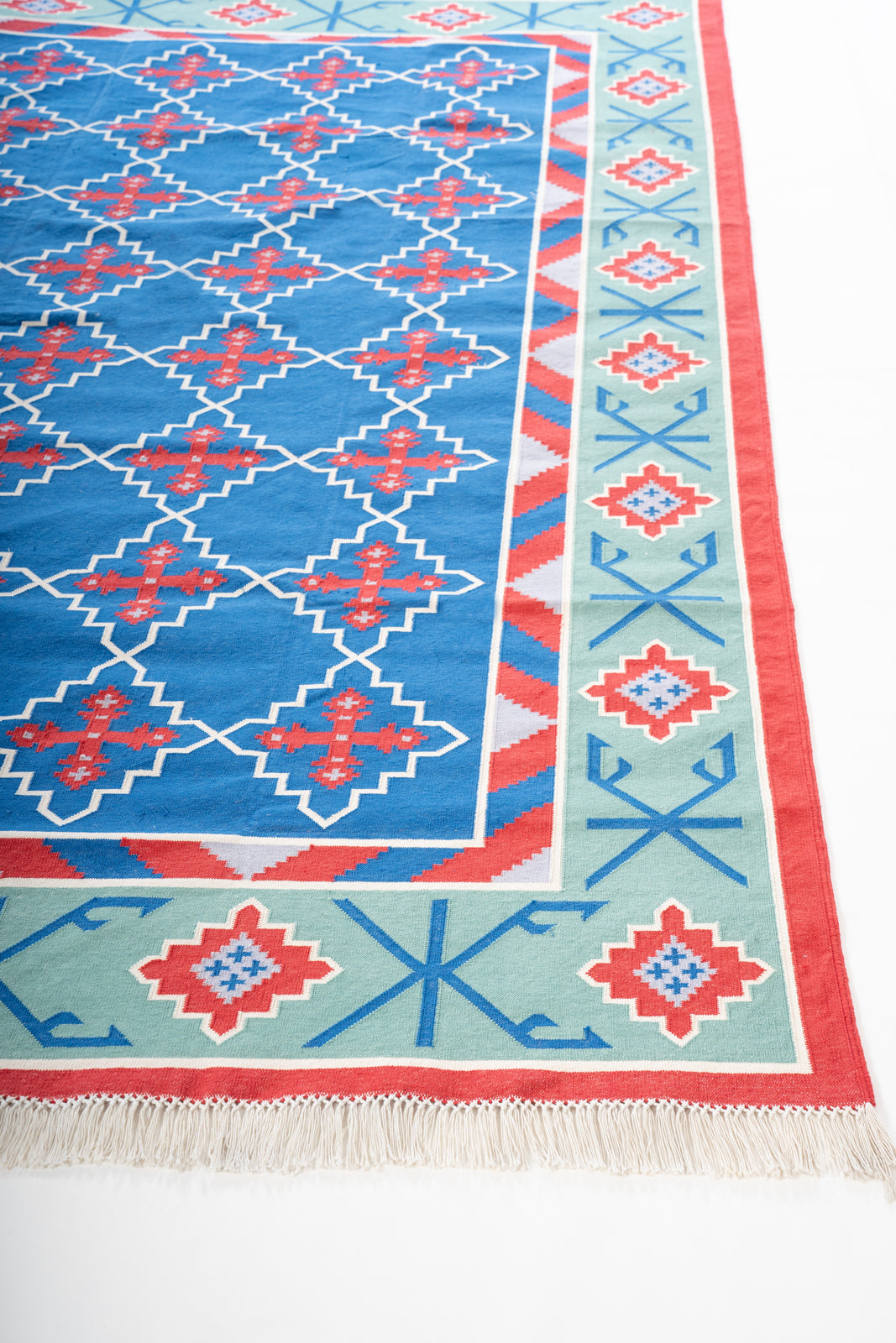 Marwar Sapphire Vintage Dhurrie Rug cotton rug styled in a living room interior