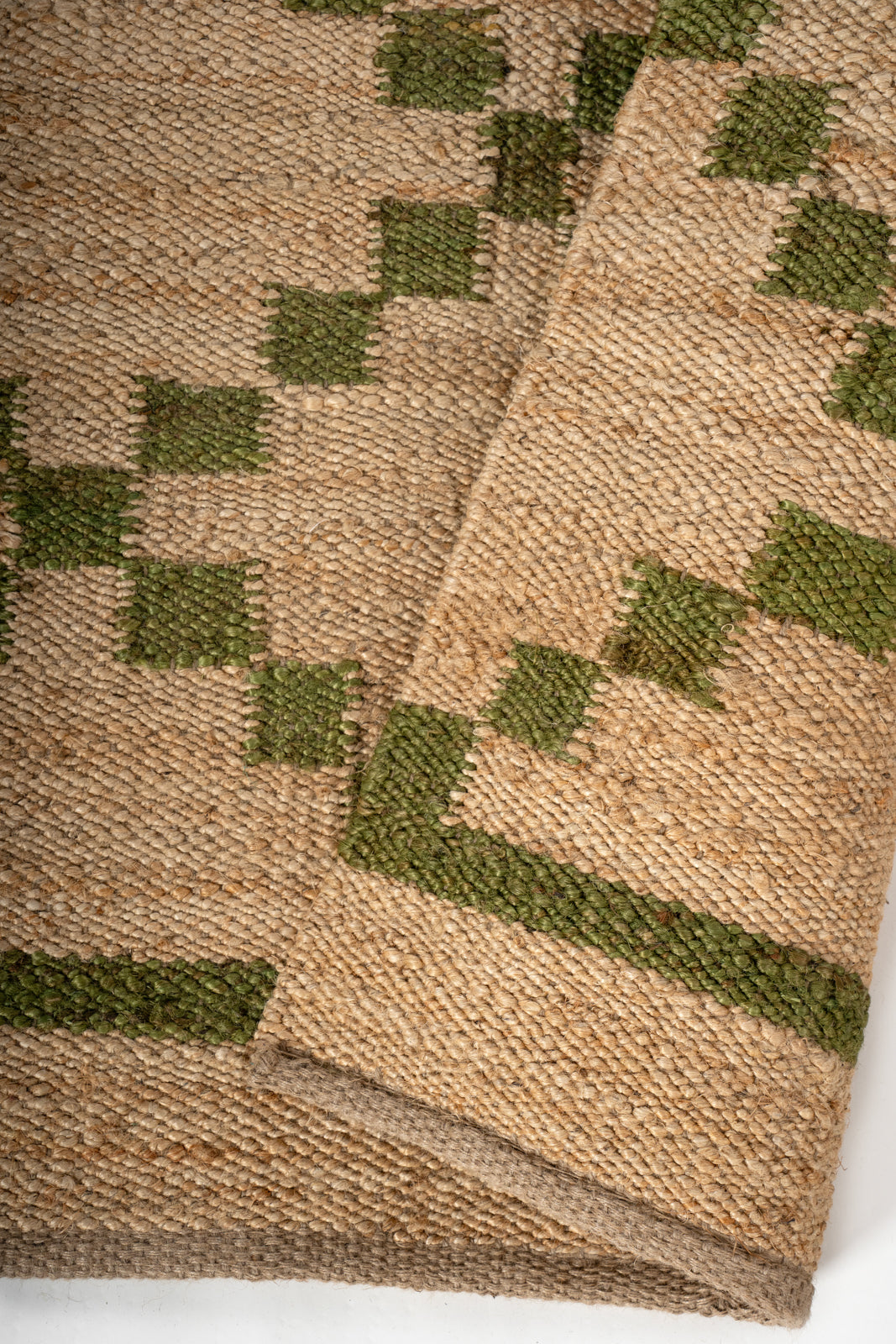 Meadow Jute Rug detail of the floral motif in jute cut pile