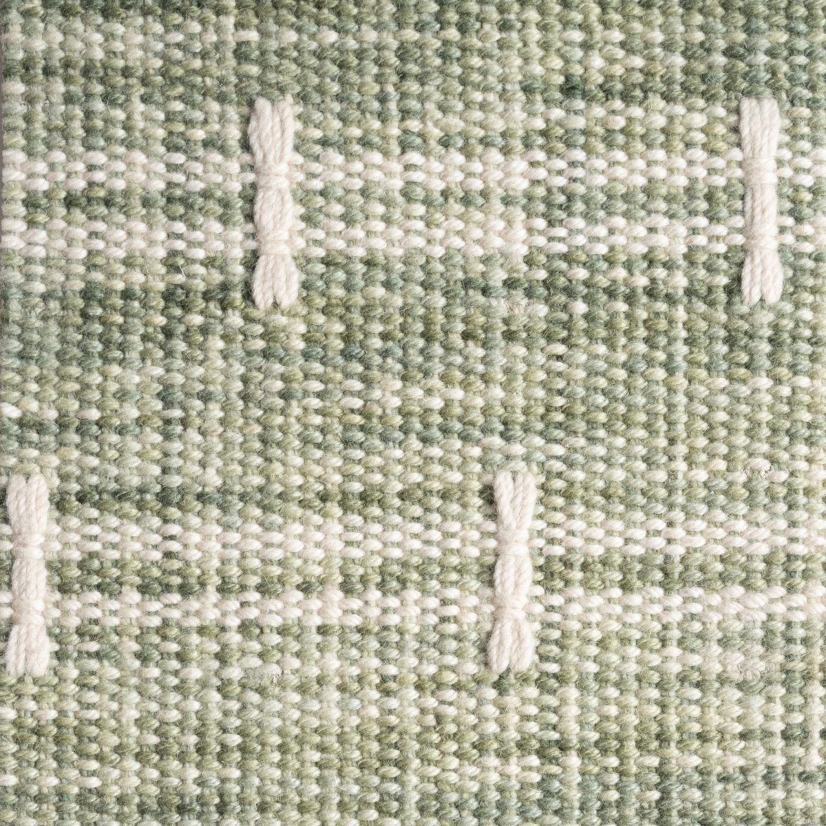 Meridian Loom : Meadow Cross wool rug in green tones
