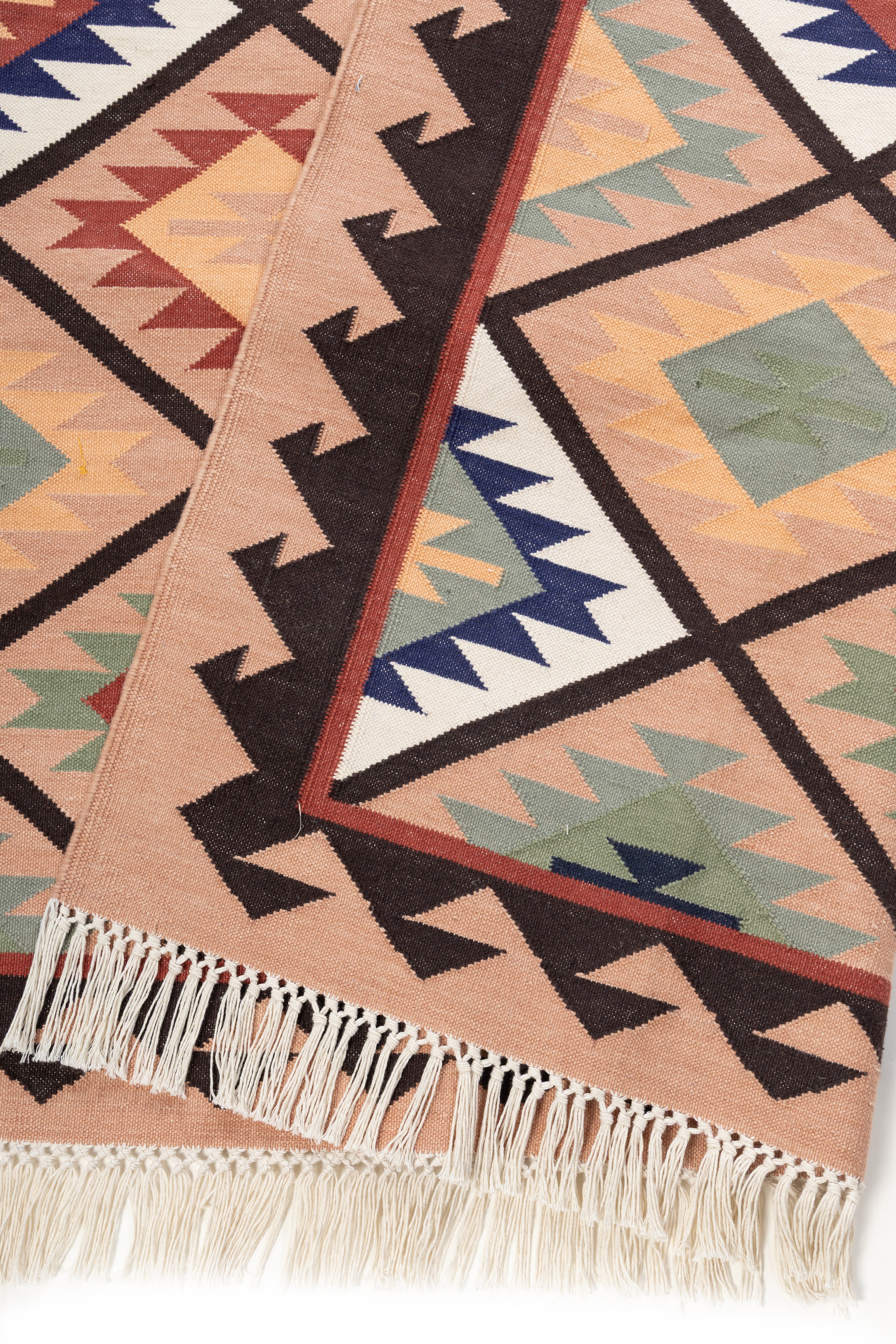 Mesa Trail Kilim Rug detail of the geometric pattern in cotton