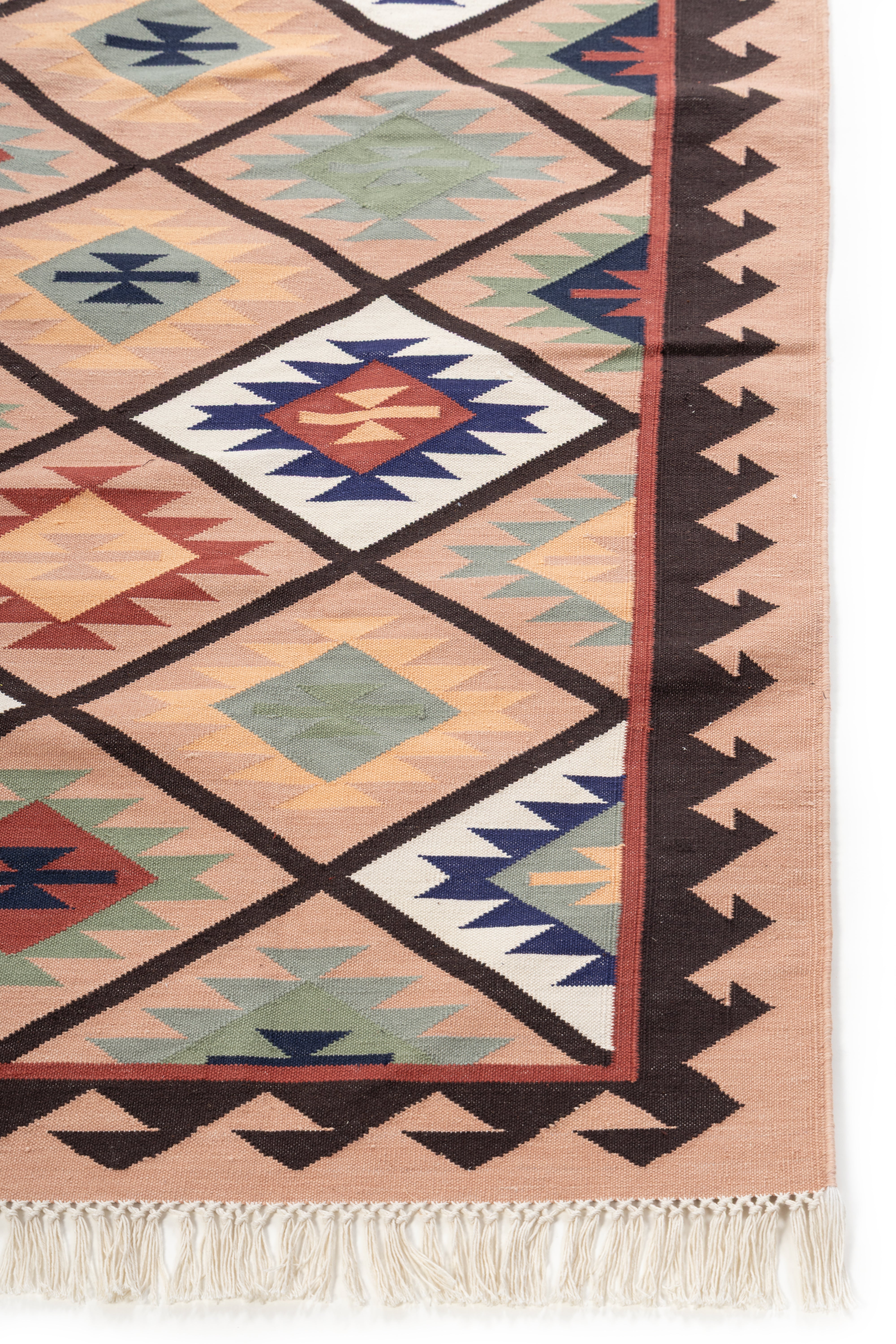 Mesa Trail Kilim Rug cotton rug styled in a living room interior