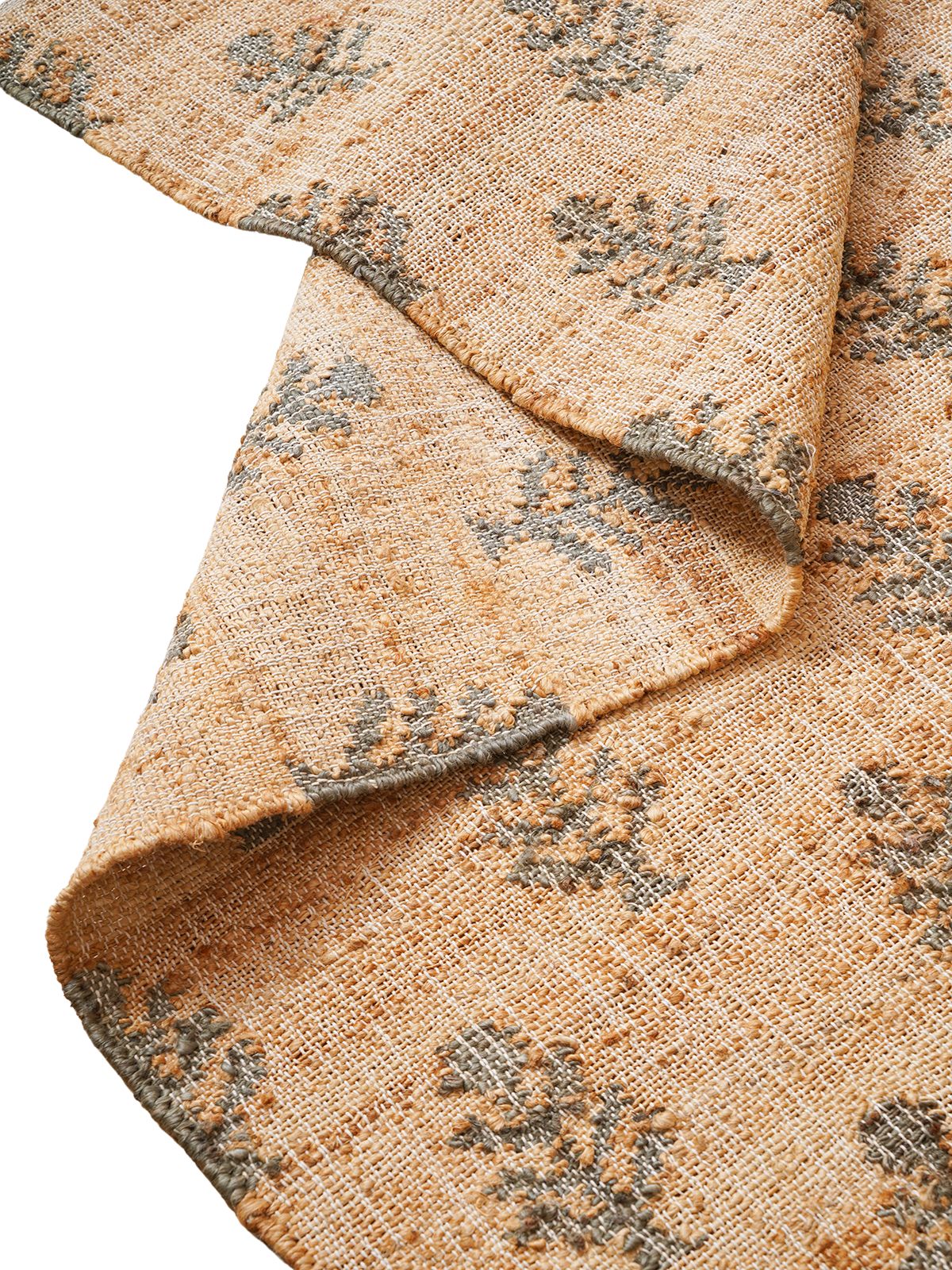 Midnight Foliage Jute Rug detail of the floral motif in jute cut pile