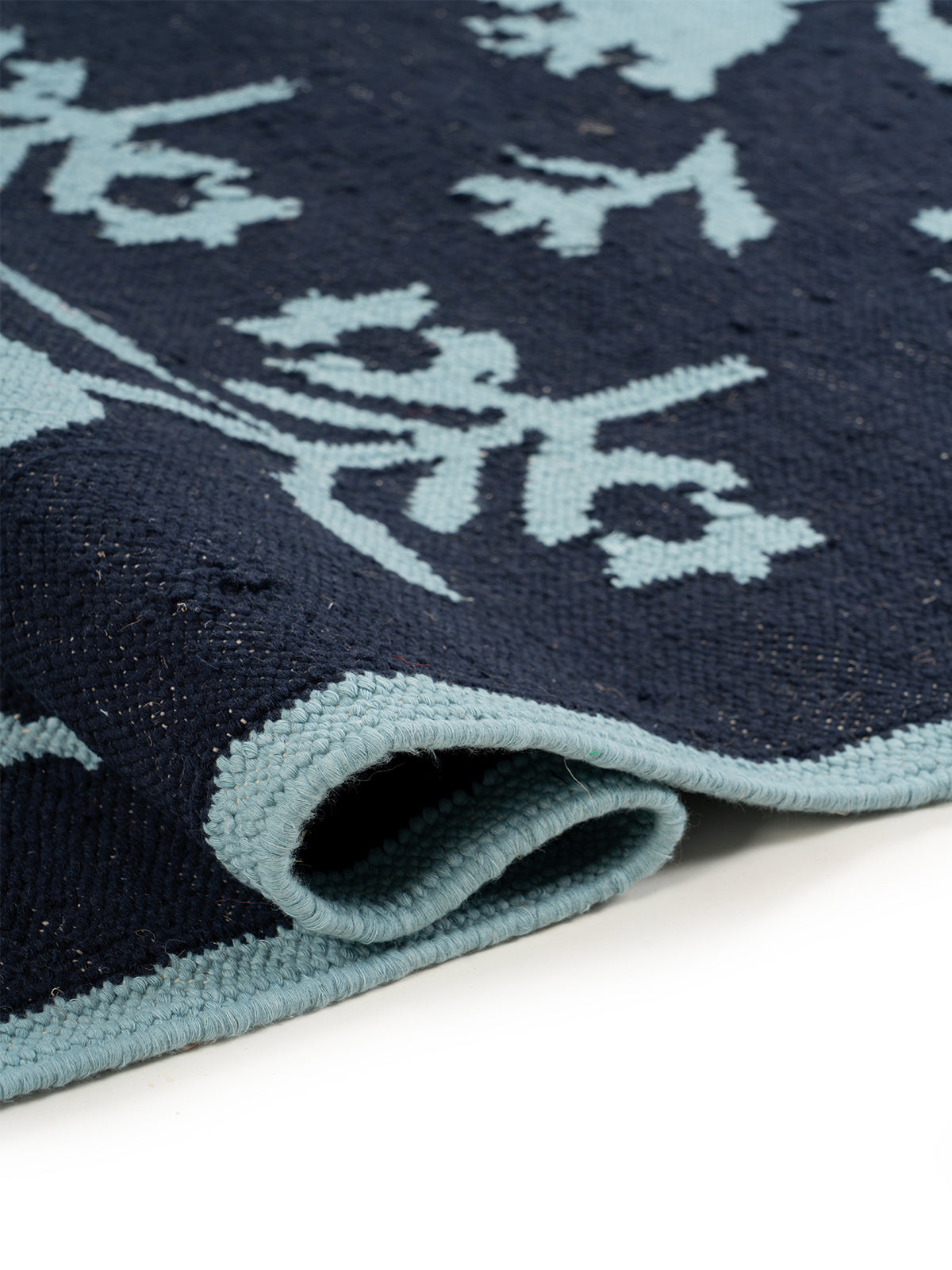 Midnight Tulip Flatweave Rug - texture detail showing wool surface