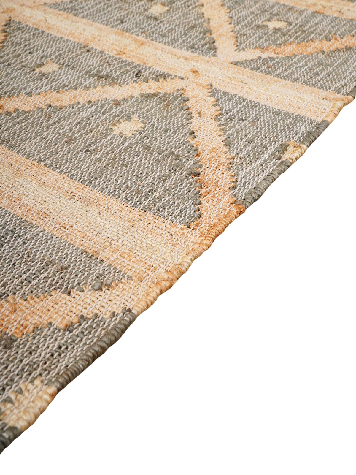 Modern Handcrafted Geometric Rug close-up showing the jute weave and geometric motif