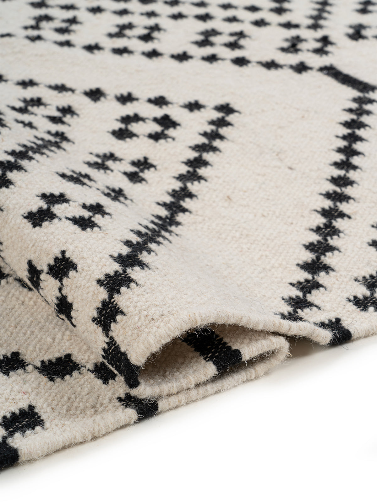 Monochrome Berber Flatweave Rug - texture detail showing wool surface