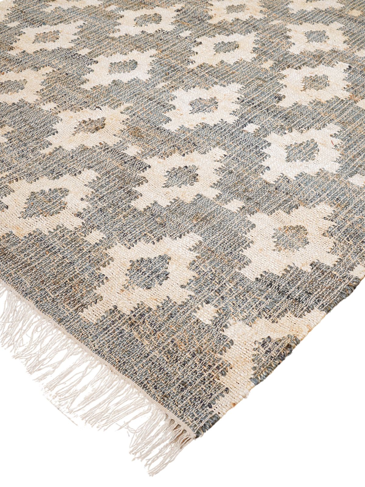 Monochrome Kilim Jute Rug close-up showing the jute weave and geometric motif
