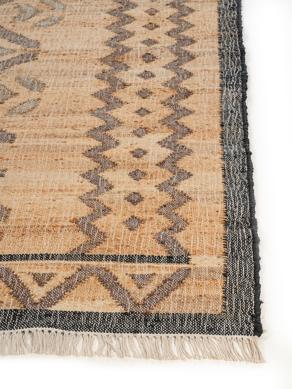 Natural Diamond Check Jute Rug jute rug styled in a living room interior