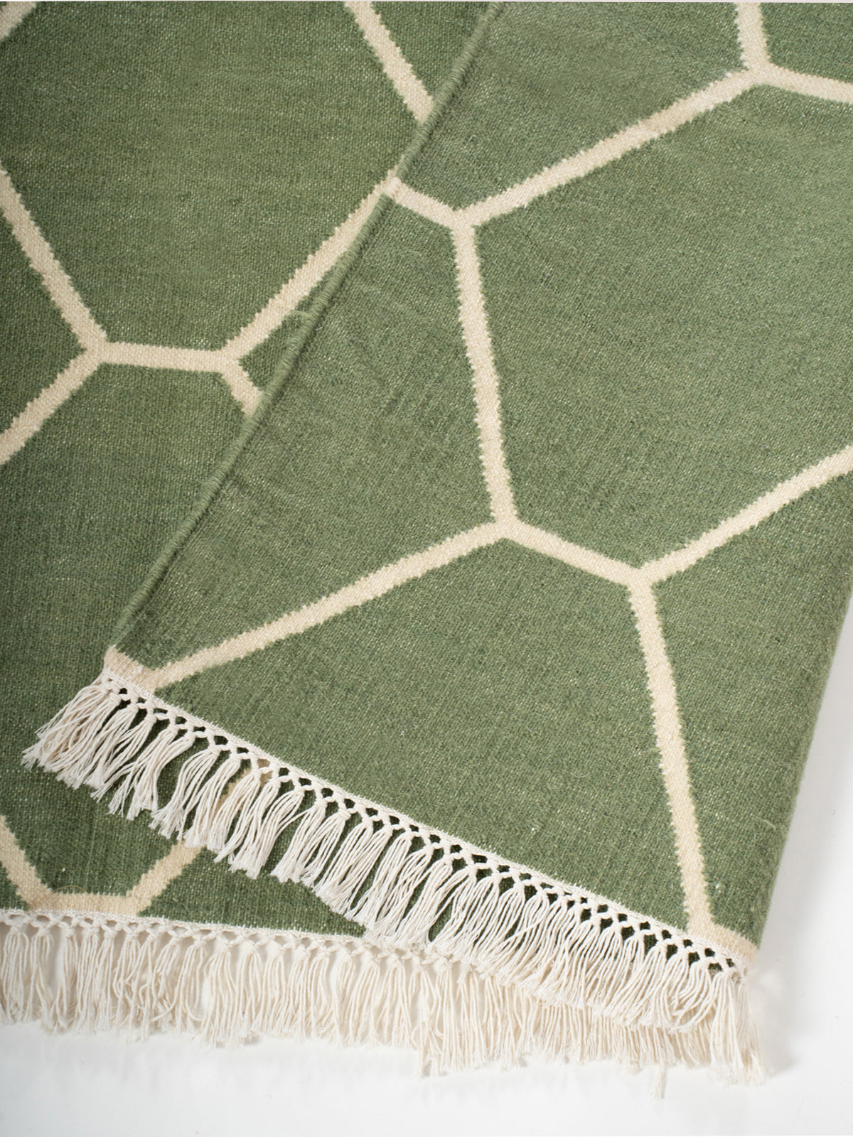 Olive Vine Dhurrie rug detail of the floral motif in cotton cut pile