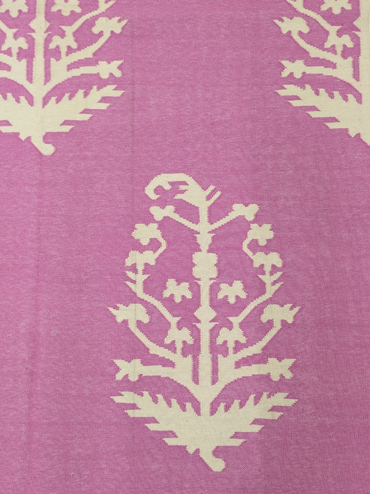 Orchid Elegance Wool Flatweave Rug detail of the floral motif in wool cut pile