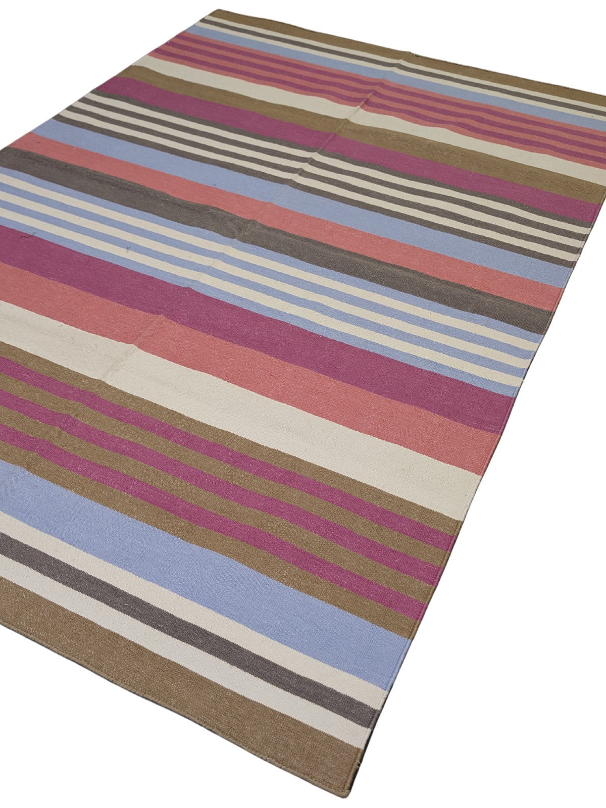 Painted Horizon Wool Rug wool rug styled in a living room interior