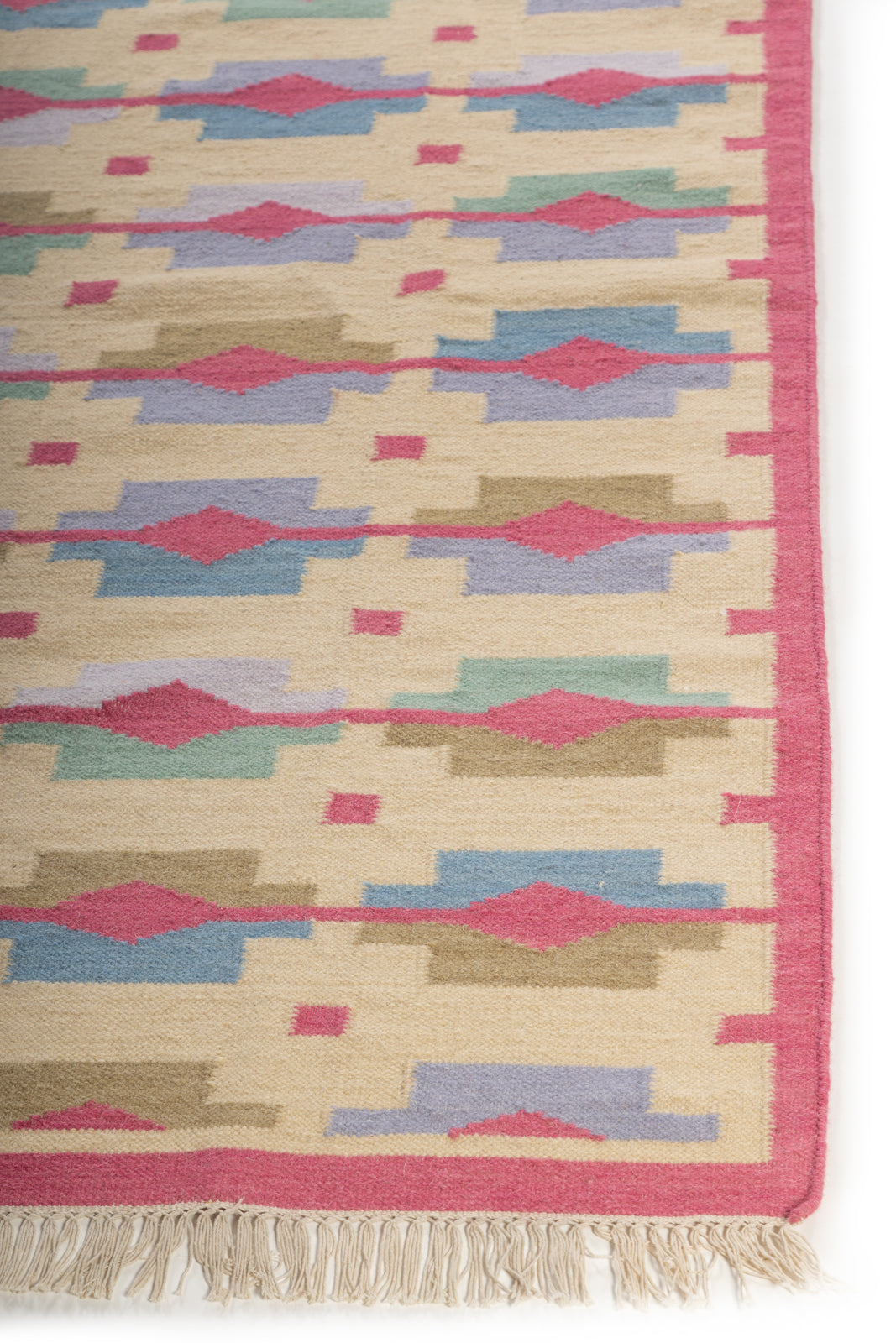 Pastel Horizon Flatweave Rug wool rug styled in a living room interior