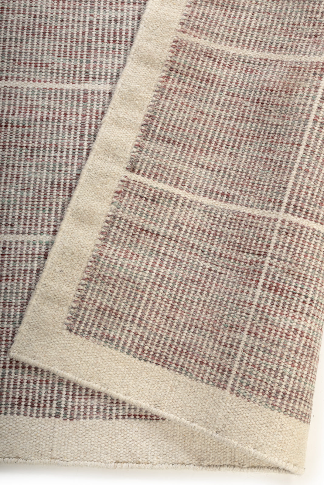 Pemberley Flatweave detail of the striped wool surface and edge finishing