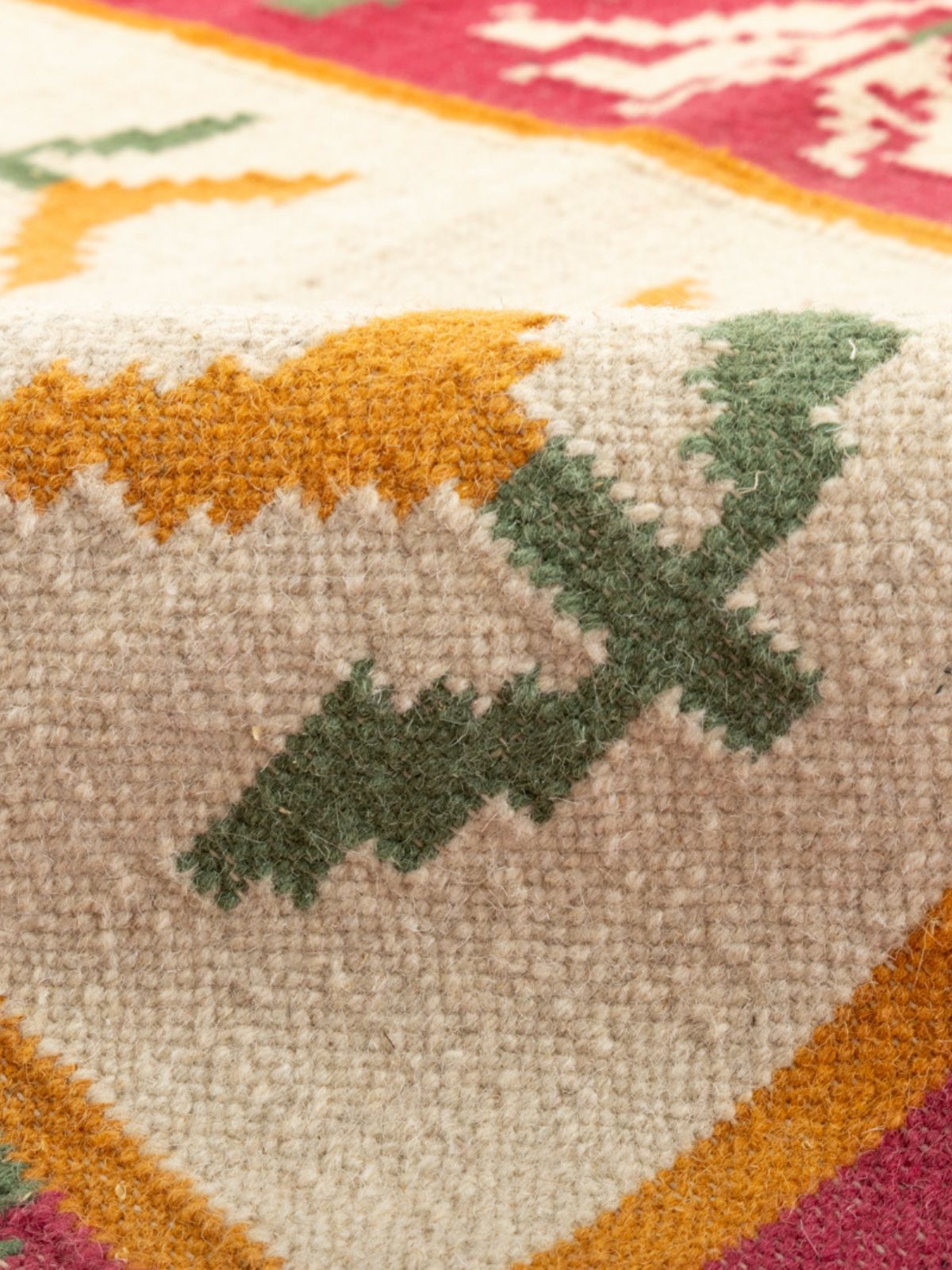 Petal Puzzle Flatweave Rug detail of the floral motif in cotton cut pile