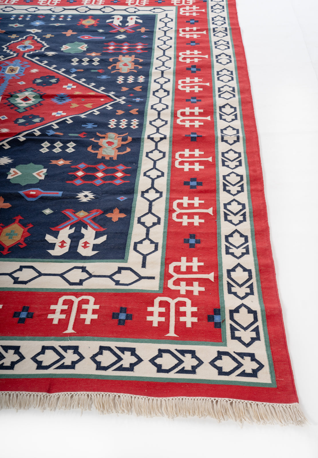Pushkar Splendor Vintage Dhurrie cotton rug styled in a living room interior